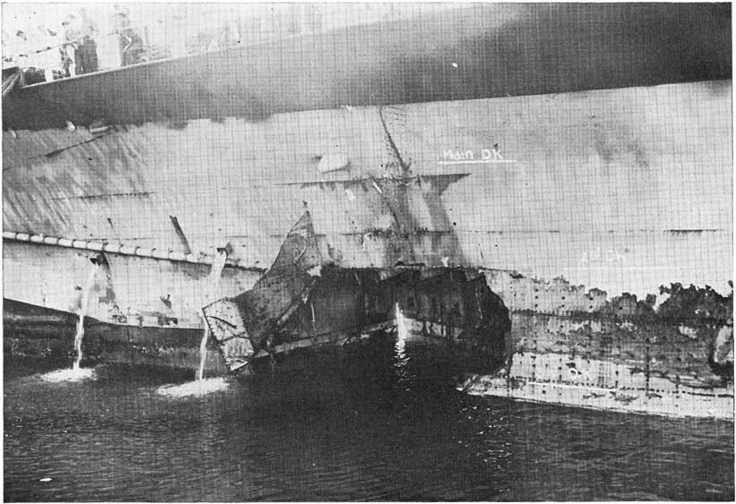 Figure 15-B. When the shell is carried away decks and bulkheads within the hull become the skin of the ship, and must withstand sea pressure and wave action.