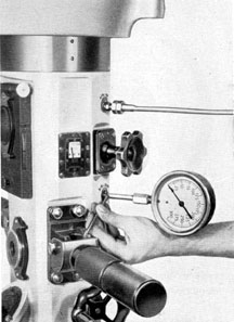 Figure 2-16. Opening the air outlet valve with an offset screwdriver.