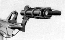 Figure 4-76. Alignment of Mark 1 checking
telescope in trunnion bracket to collimator reticle.