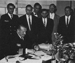 Photo of the charter being signed.