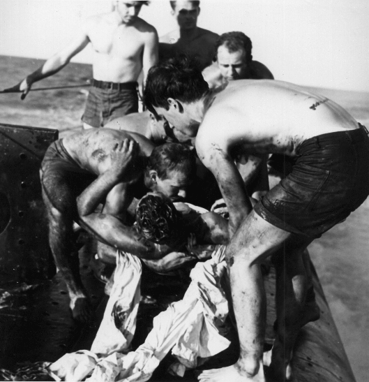 Once aboard Pampanito the rescued POWs were cleaned up, lowered below and cared for during the four day trip to Saipan.