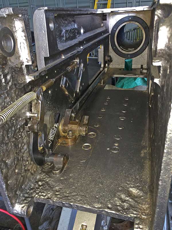 inside with the firing mechanism and hand operating gear installed