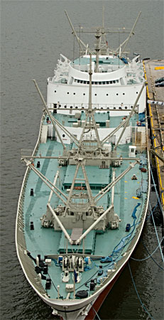 Overhead photos showing deck, cargo booms and hatch covers forward.
