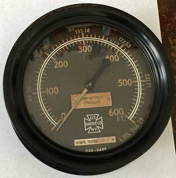 Photo of compartment pressure gauge from collection.