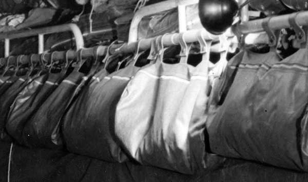Photo of bunk bags in torpedo room 1945