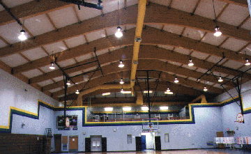 Photo showing interior beams at Hannahville High School Gym