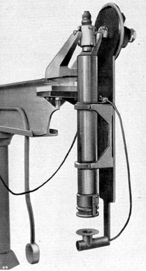 Figure 4-77. Alignment of the collimator using
the Mark 1 checking telescope attached in the
trunnion bracket.