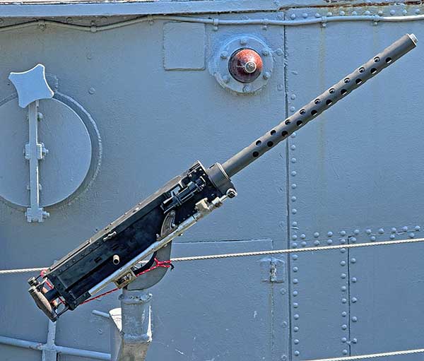 gun with mount in stanchion on boat