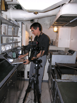 Bruce shooting in the galley.